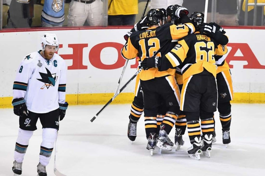 Pittsburgh Penguins players celebrate Nick Bonino’s game-clinching goal in game one of the Stanley Cup Finals against the San Jose Sharks. Photo: AFP