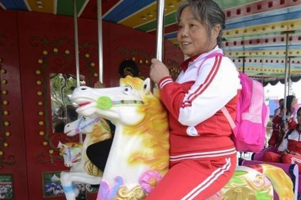 A middle-aged woman enjoys a ‘student’s day out’ at a theme park in Changsha, central China, in the run up to the International Women’s Day. Photo: SCMP Pictures