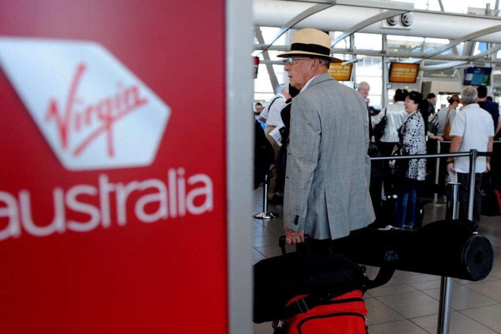 HNA’s deal to buy up to a 20 per cent stake in Virgin Australia praised by analysts as a good strategic fit. Photo: EPA ZEALAND OUT