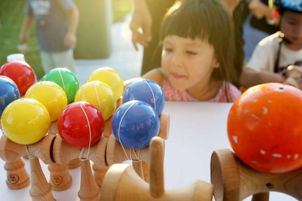A girl takes part in a workshop held as part of the West Kowloon Cultural District’s Freespace Happening event. Photo: Nora Tam