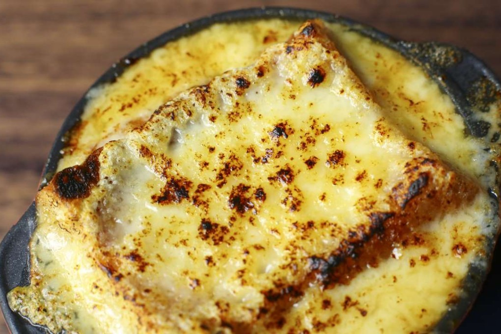 French onion soup topped with cheese on toast at Bond. Photos: Edmond So