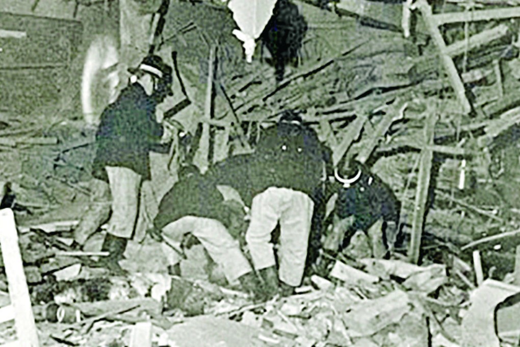 Rescuers pick through the rubble after the explosion. Photo: SCMP Pictures