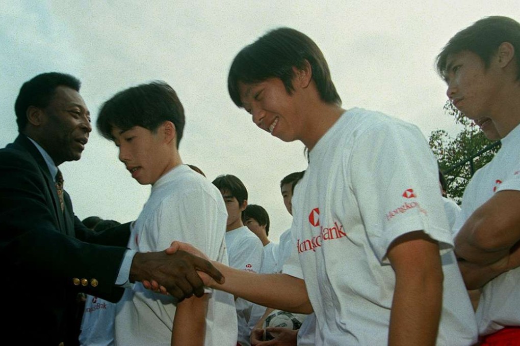 Pele greets players at a soccer clinic for young players at the Hong Kong Sports Institute in Sha Tin in 1998. Photo: SCMP Pictures