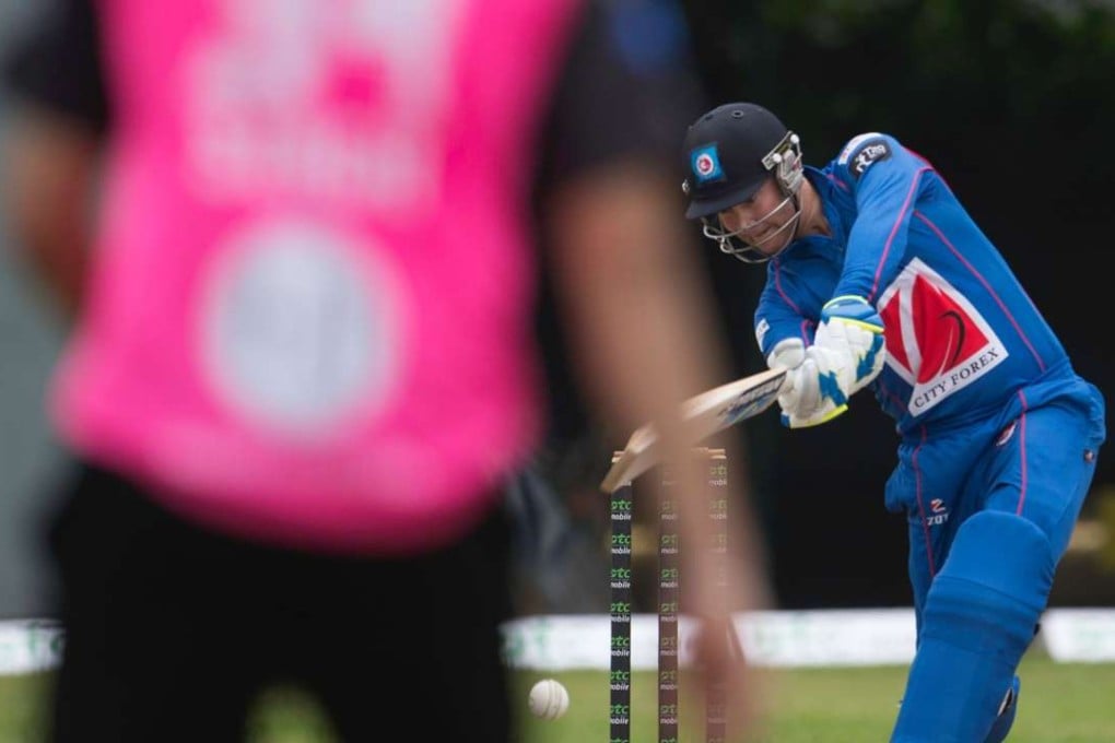 Michael Clarke plays a shot for the Kowloon Cantons against Hung Hom JD Jaguars during the Hong Kong T20 Blitz. Photo: AFP