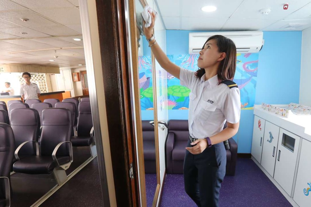 A First Ferry crew member cleans the breastfeeding station. Photo: Dickson Lee
