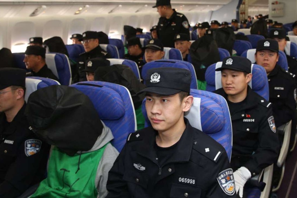 Mainland police flying back to China after apprehending phone scam suspects in Kenya in April. Photo: Xinhua