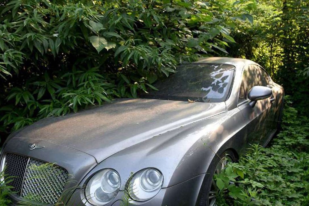 A luxury car lies abandoned in the car park in Chengdu, Sichuan province. Photo: SCMP Pictures