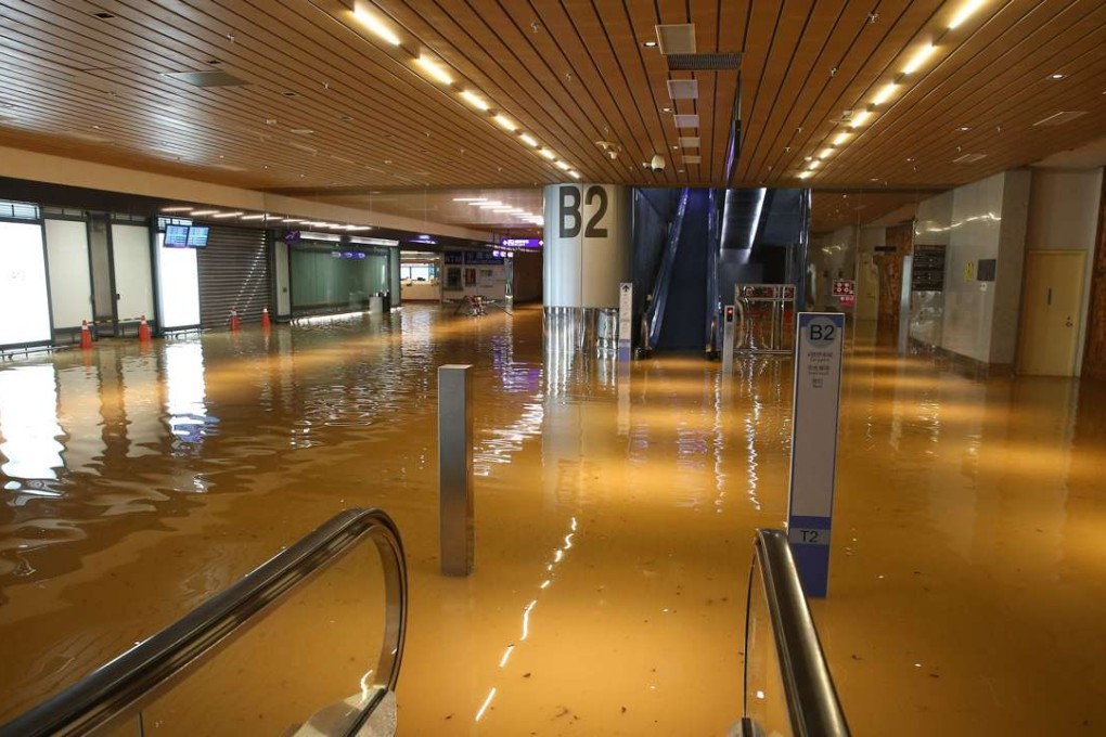 A flooded area inside the Taoyuan International Airport on Thursday. The island’s premier, Lin Chuan, ordered authorities to hold the company in charge of the airport’s construction project and other relevant personnel ­accountable. Photo: AFP