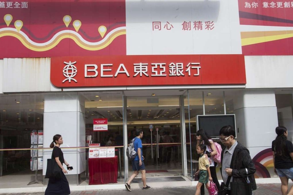 Bank of East Asia might have started a trend in laying off staff. Photo: EPA