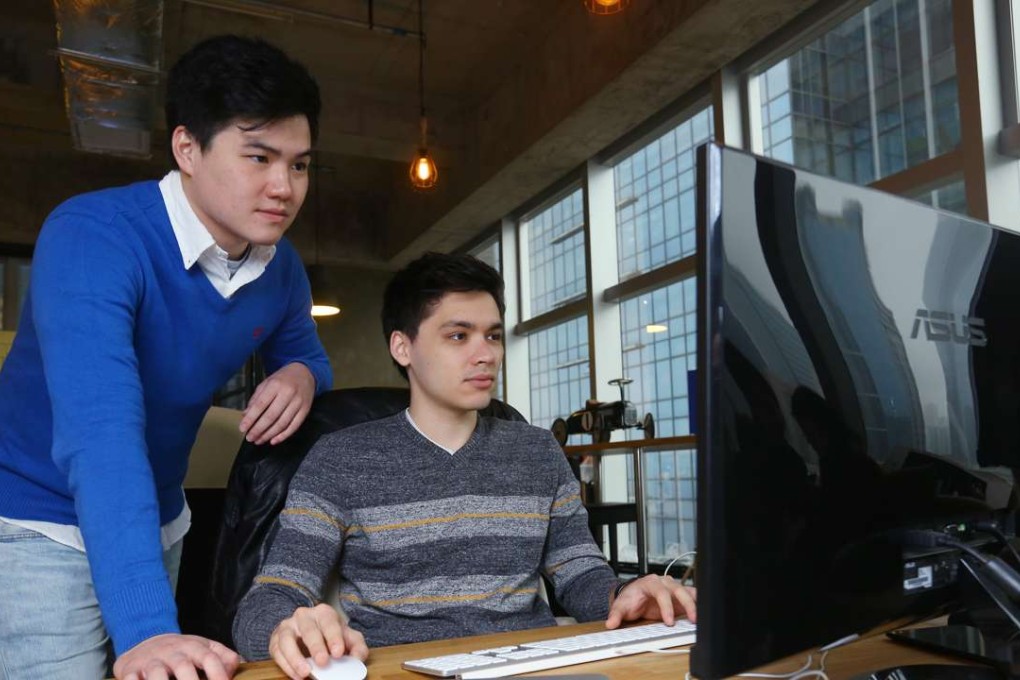 Timothy Yu (L), co-founder of Snapask, in KwunTong. Photo: Edmond So