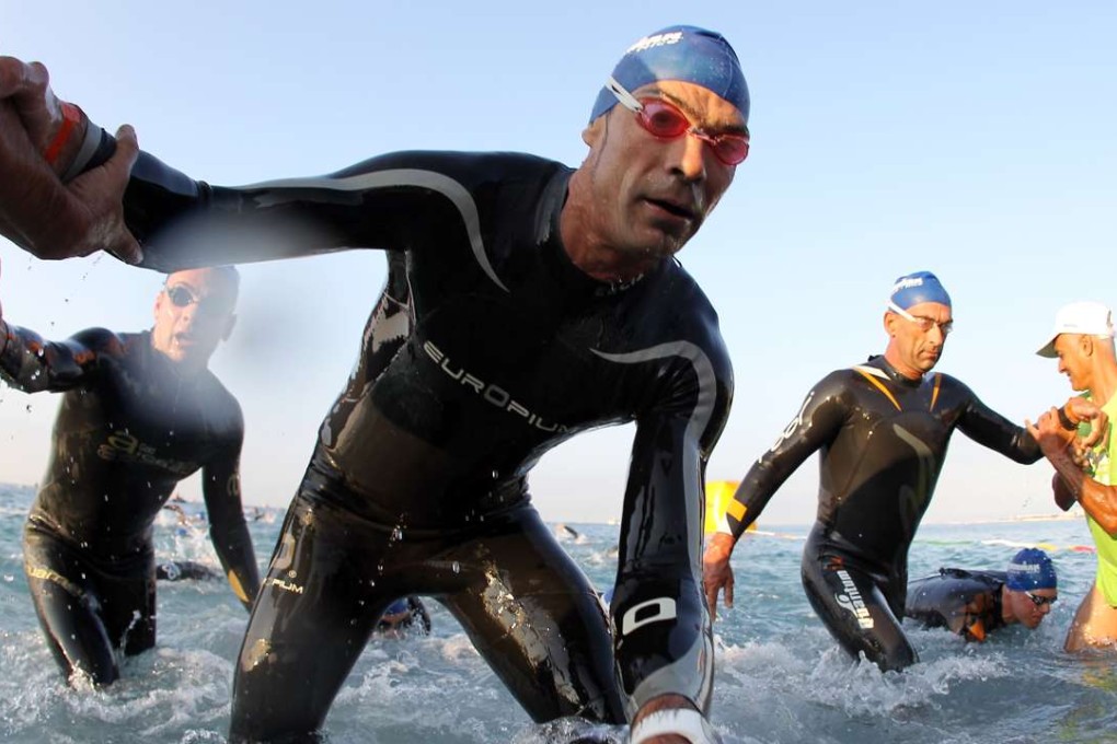 Ironman triathletes push themselves in competition and training. Photo: AFP