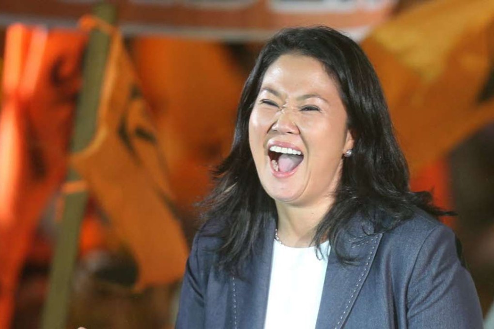 Peruvian Presidential candidate for the Fuerza Popular Party, Keiko Fujimori, dances during a campaign event in Lima on Thursday. Photo: EPA