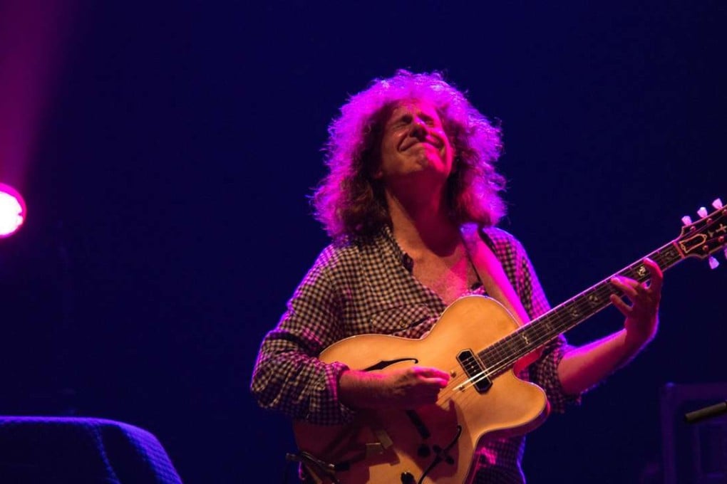 Jazz musician Pat Metheny performs at the Academic Community Hall, Hong Kong Baptist University. He started and ended the concert with an acoustic guitar solo. Photo: Johnny Leung