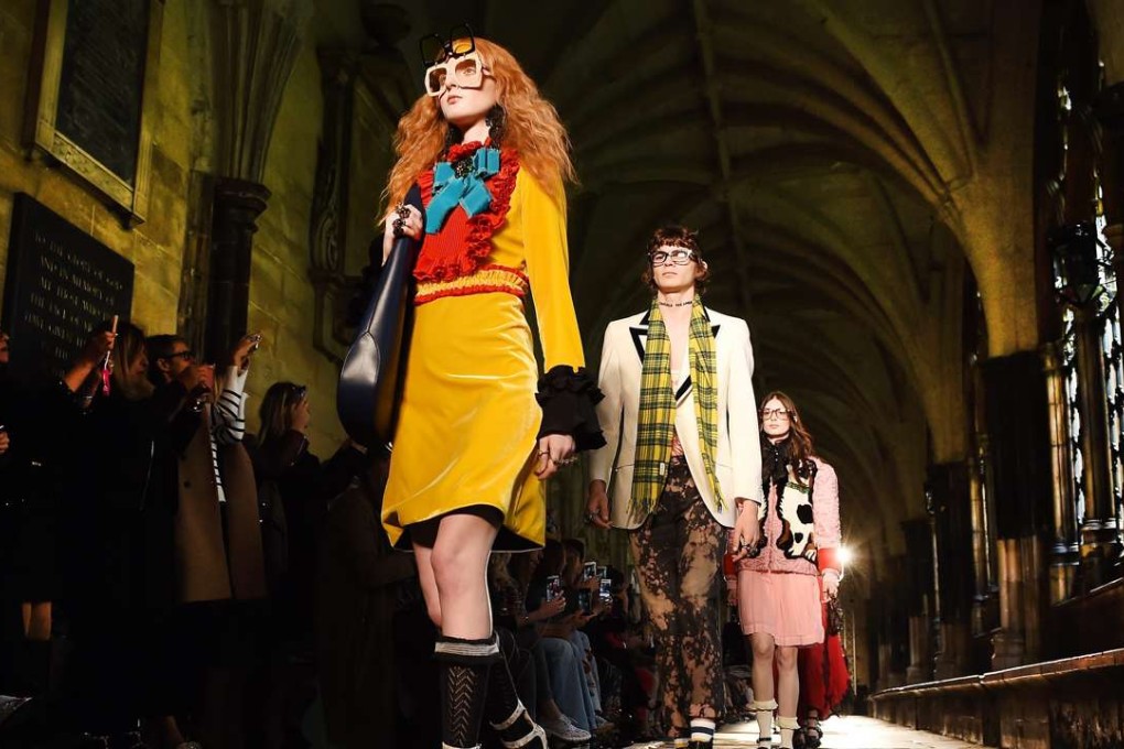 Models present 2017 cruise wear creations by Gucci at Westminster Abbey in London. Photo: EPA