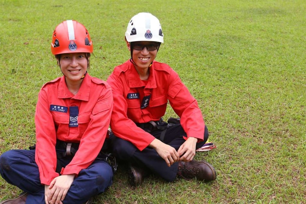 Civil Aid Service Tactical Force Mountain Search and Rescue Company Kenix Chiu Pik-ying (Left) and Waiter Poon Chung-wa (Right) pose fora a picture at Civil Aid Service Yuen Tun Camp in Sham Tseng. 08MAY16 SCMP/Kenix Chiu and Walter Poon must learn to tie 10 different knots as part of their training for mountain rescue operations. Photo: Edmond So