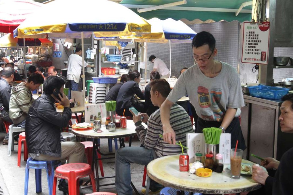 Hong Kong’s dai pai dong are much loved by residents and tourists alike. Photo: Dickson Lee