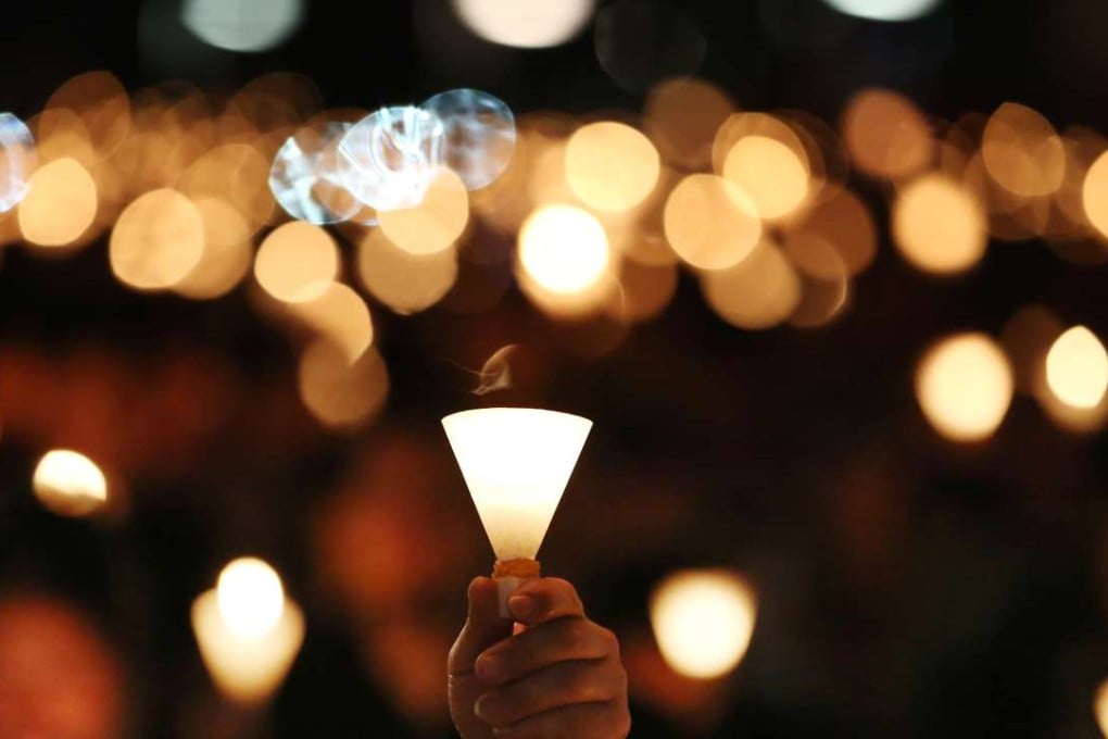 Lit candles at Victoria Park last year marking the 26th anniversary of the Chinese military crackdown on the pro-democracy movement in Beijing. Photo: Nora Tam