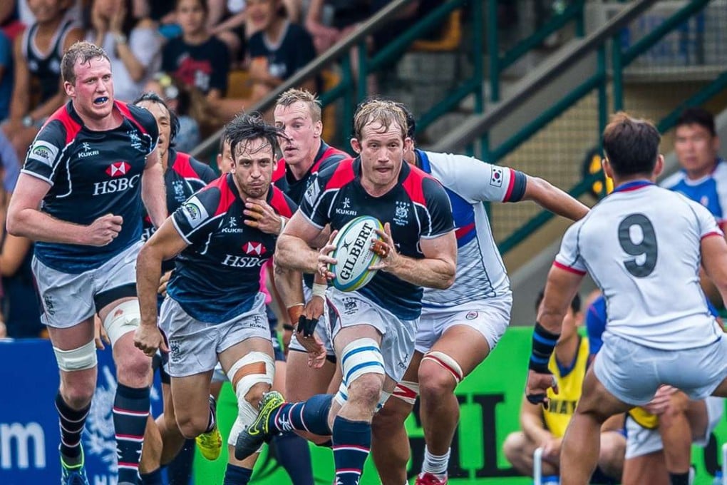 Toby Fenn finds himself in space en route to scoring against South Korea in their Asia Rugby Championship game at the Hong Kong Football Club. Photos: Ike Li/Asia Rugby