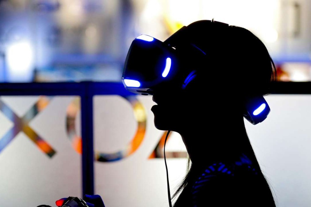 A gamer wears a Virtual Reality (VR) game console during the 2016 Taipei game show in Taiwan. Photo EPA, Ritchie B. Tongo