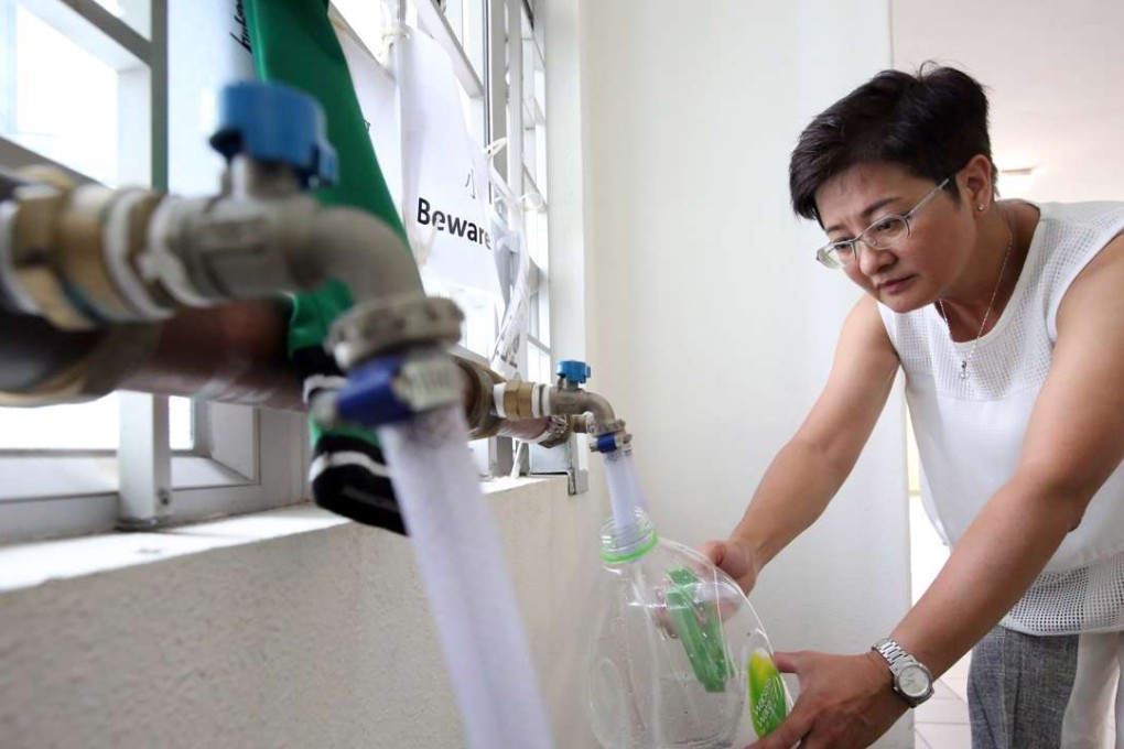 Democratic Party lawmaker Helena Wong carries out tests for lead last year. Photo: Nora Tam