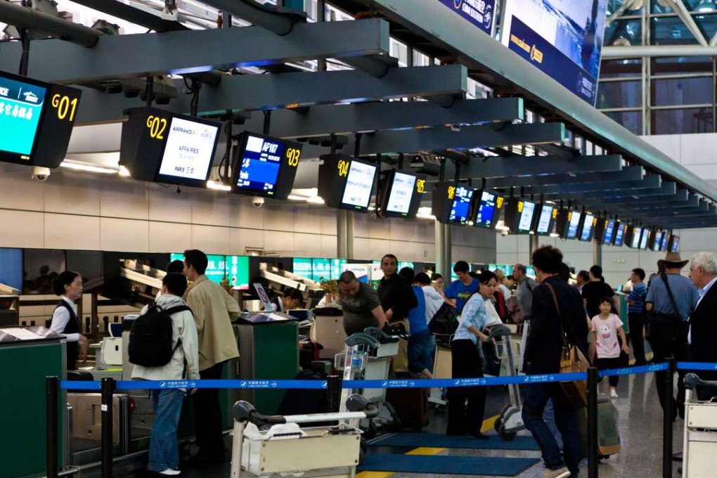 More than 100 flights departing from and arriving at Guangzhou and Shenzhen were cancelled and almost all others delayed in Saturday’s storm. Photo: SCMP Pictures