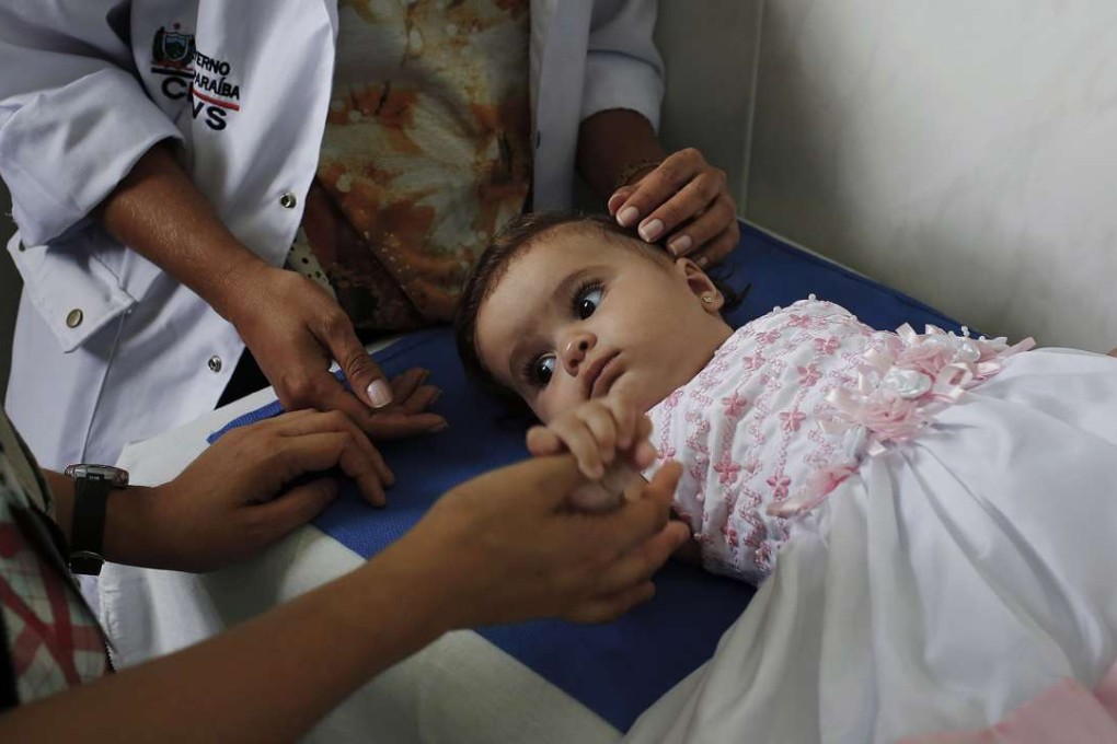 A six-month-old baby is checked for Zika virus in Juazeirinho, Brazil. Photo: Los Angeles Times
