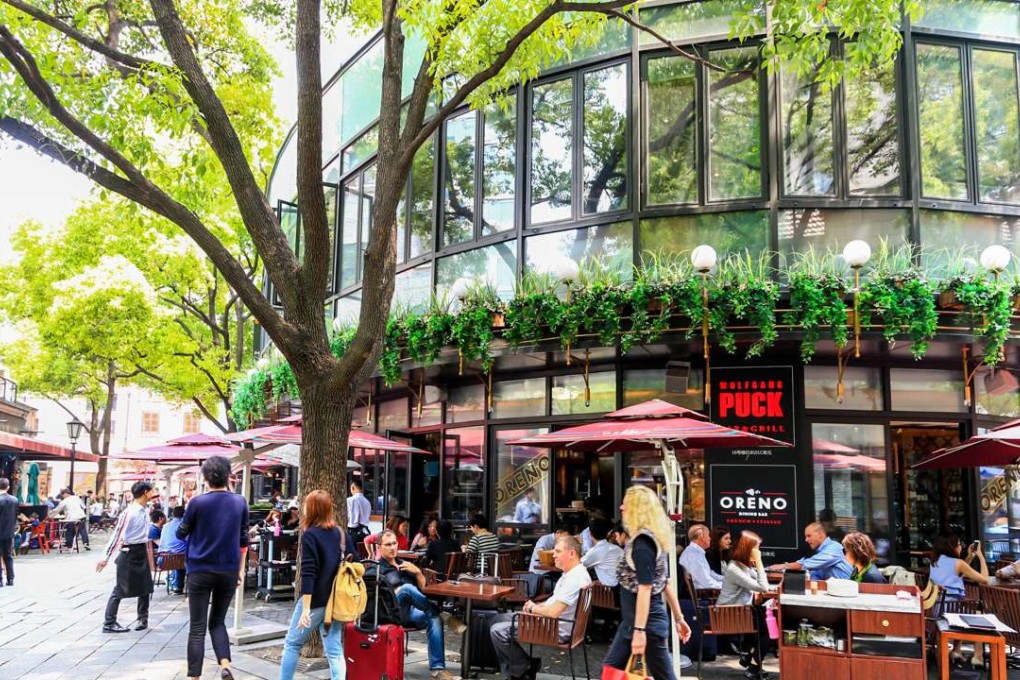 Xintiandi at the edge of the old French Concession offers a great vantage point for people watching from restaurants and pavement cafes. Photo: ImagineChina