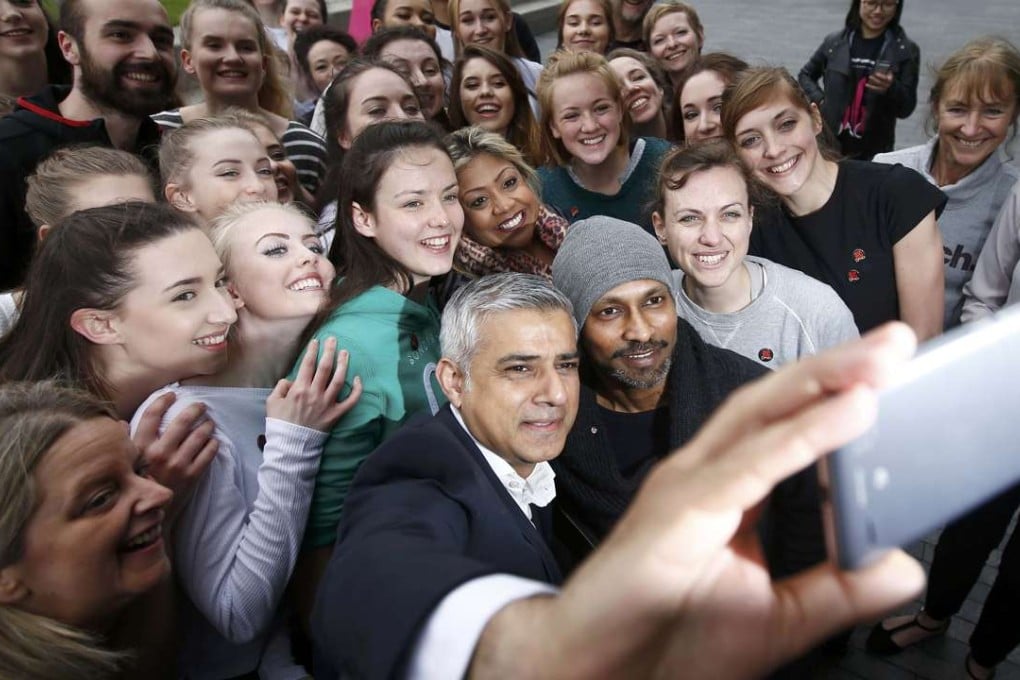 London mayor Sadiq Khan takes a selfie with choreographer Akram Khan (centre) and dancers at a “Big Dance Pledge” event at City Hall in London last month. Photo: Reuters