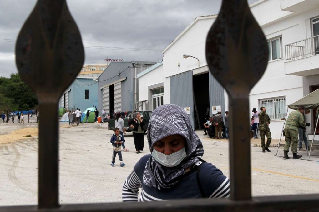 Muslim refugees are pictured at a reception centre at Derveni near the Greek northern city of Thessaloniki last month. Photo: Xinhua