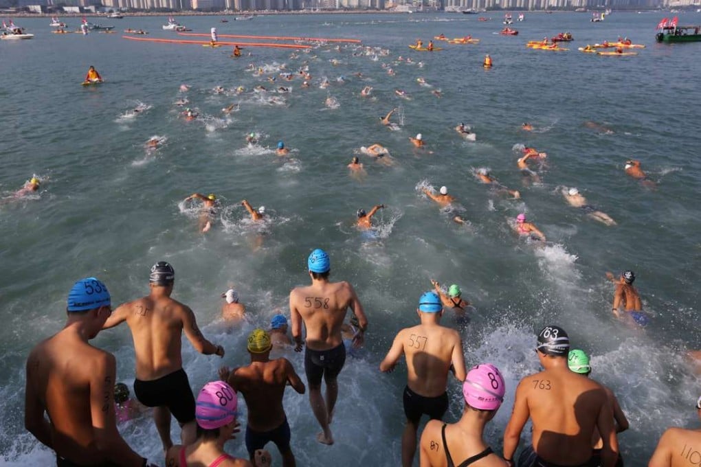 Swimmers compete at the 2014 cross-harbour race. Photo: Sam Tsang