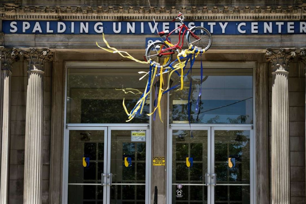 A bike hangs outside Spalding University Centre where boxing legend Muhammad Ali began his interest in boxing after having his bike stolen. Photos: AFP