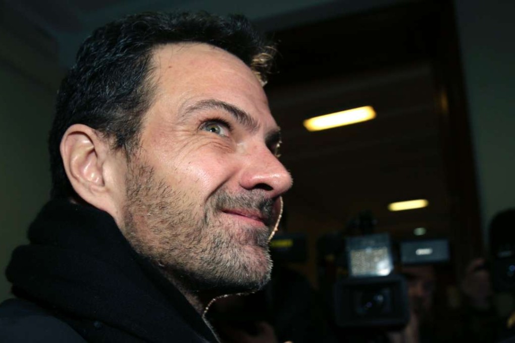 French rogue trader Jerome Kerviel arrives Tuesday at a Paris courthouse, where his former employer, Societe Generale, was told to pay him a bonus and compensation totalling more than US$500,000. Photo: AFP