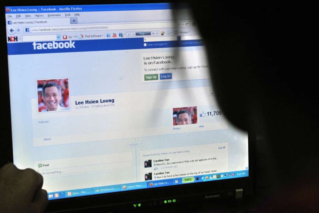 Singapore will cut off internet access for government work stations within a year for security reasons. Photo: AFP