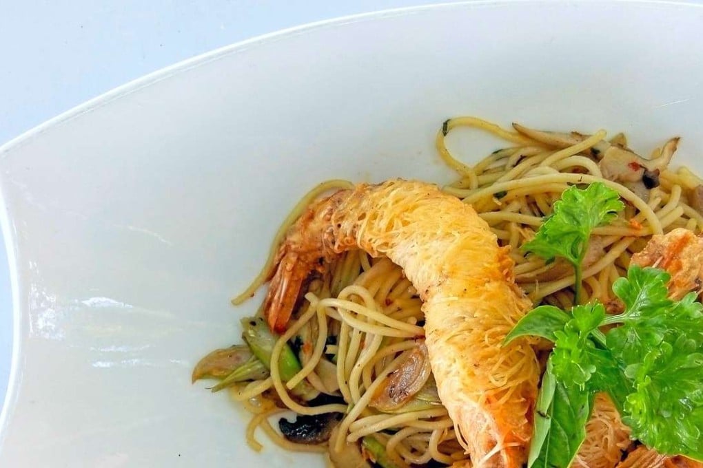 Spaghetti aglio olio with prawn in crisp “sarong” at Thirty Two restaurant in George Town, Penang.