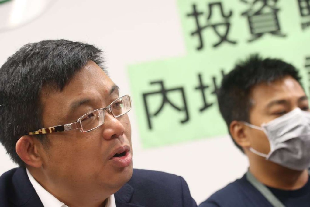 Democratic Party legislator James To Kun-sun (left), with Hongkonger Mr Wong, revealing details of the alleged investment scam. Photo: David Wong