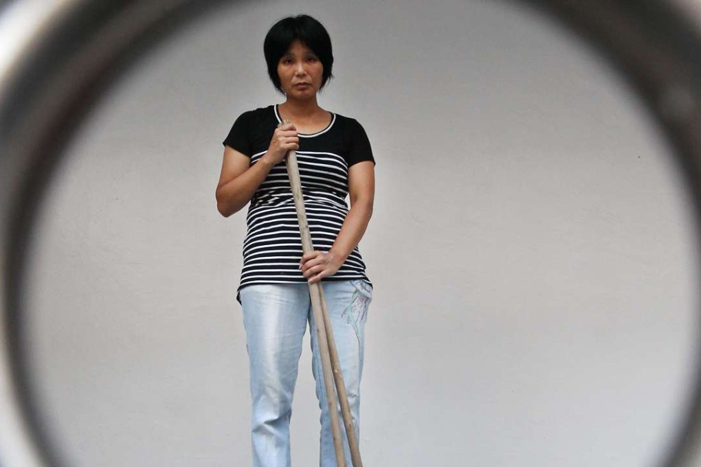 Liang Xiuqiong, a school cleaner at Shek Kip Mei. Photo: Felix Wong