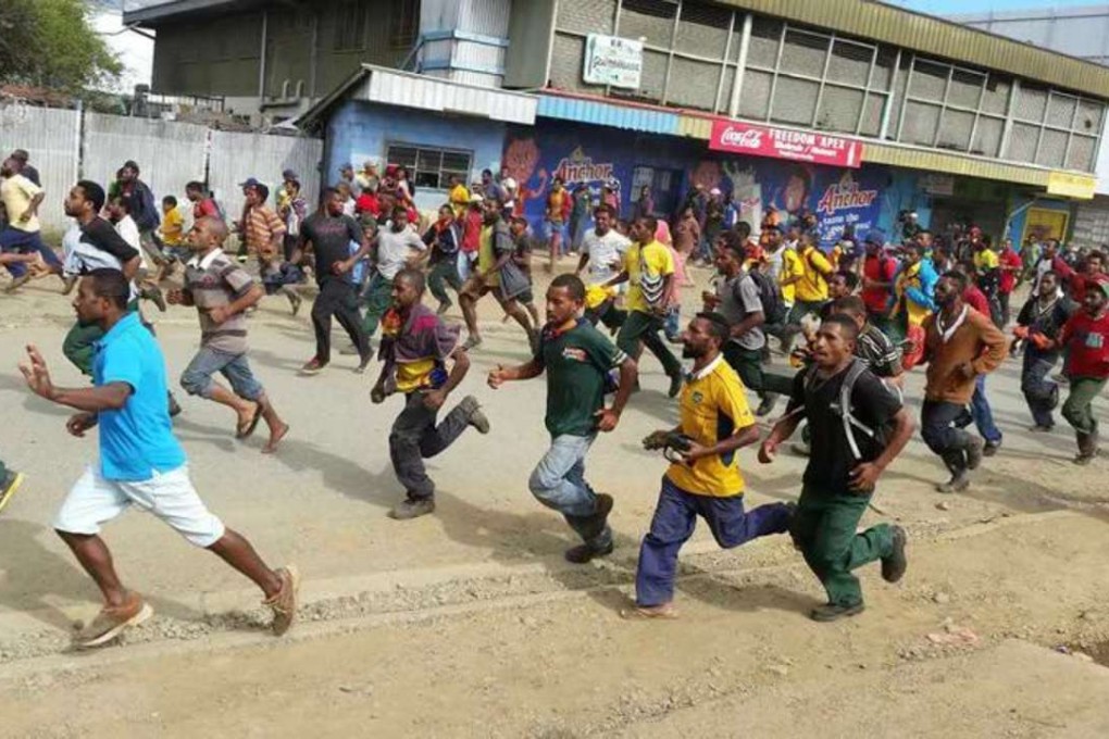 A police and anti-government protestors clash spills over into widespread rioting and looting in the nation's capital. Photo: Xinhua