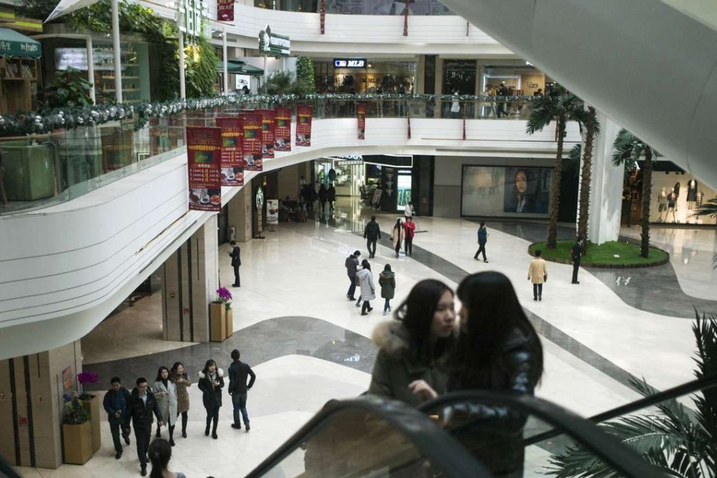 Shopping mall operators in China mainland are looking to free themselves of the costs of physical ownership of the malls by finding ways to lease them and use the money to expand other operations. Photo: Agence France-Presse