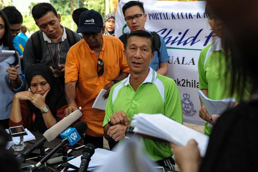Law Hong Soon, deputy chief of criminal investigation in the Royal Malaysian Police, addresses media. Photo: AFP