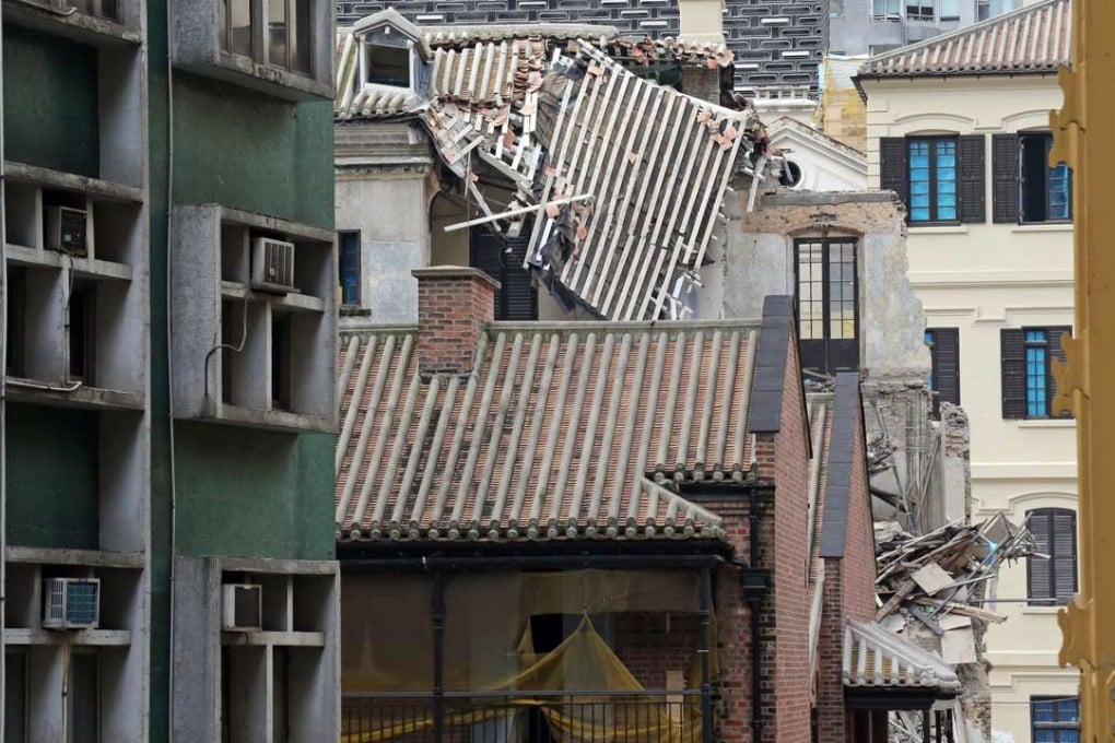 An outer wall and part of the roof of the married inspectors' quarters in the former Central Police Station collapsed last month. With several very old buildings on this site, more checks and precautions are now essential. The safety of workers on the site and the public in the surrounding areas comes above everything else. Photo: Felix Wong