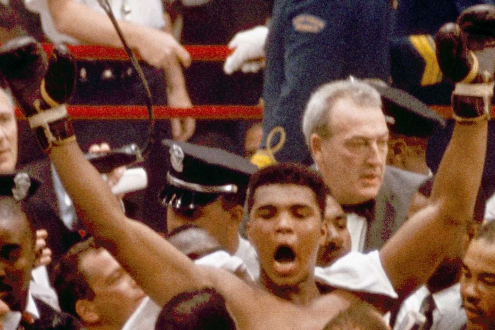 Muhammad Ali, or Cassius Clay at the time, strikes a familiar pose as he shouts "I am the greatest" after beating former heavyweight champion Sonny Liston in Miami Beach in 1964. Photo: AP
