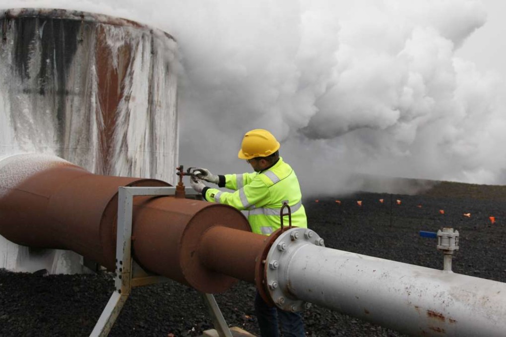 A technician checks a valve at a test well at Reykjavik Energy's Hellisheidi geothermal power plant in Iceland.Photo: AP
