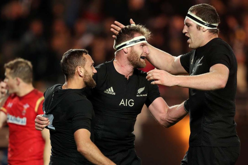 All Blacks captain Kieran Read celebrates a try with teammates Aaron Cruden and Brodie Retallick during New Zealand’s comfortable 39-21 win over Wales. Photo: AFP