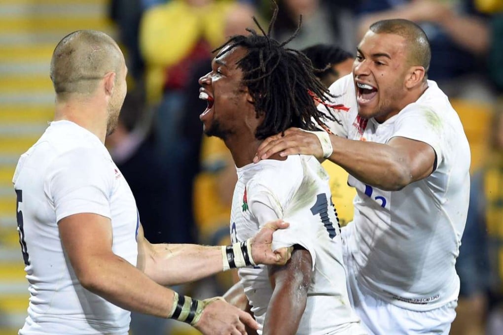England’s Marland Yarde (centre) celebrates his try with Mike Brown (left) and Jonathan Joseph. Photos: AFP