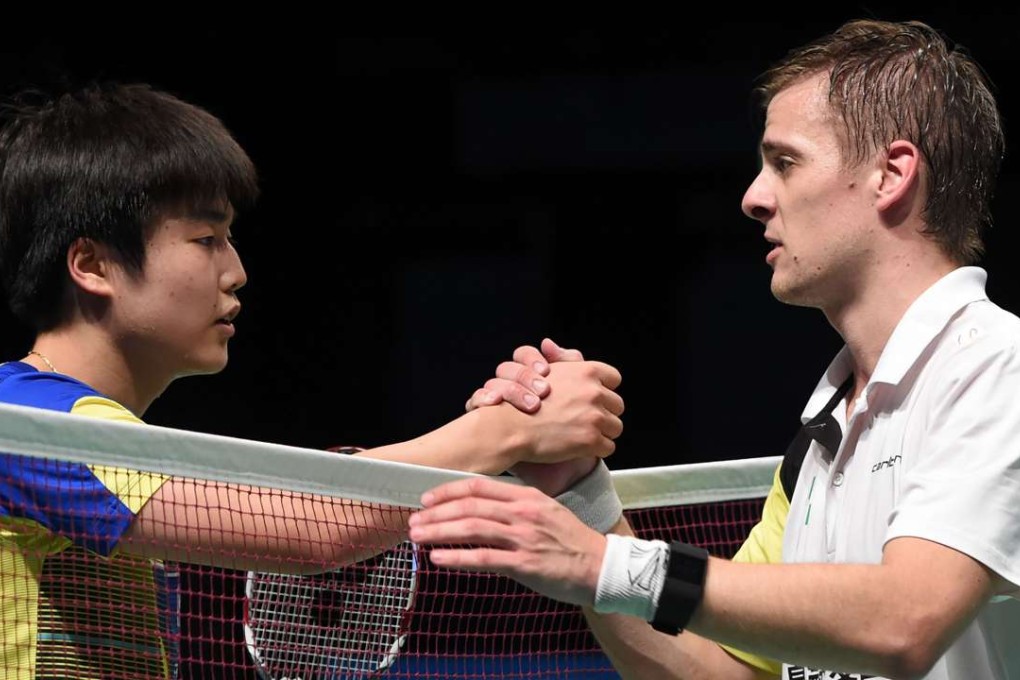 Denmark's Hans-Kristian Vittinghus shakes hands with South Korea's Jeon Hyeok-jin after winning the Australian Open. Photo: AFP