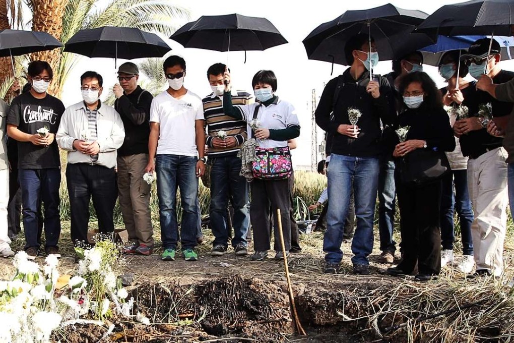 Family members of the victims in the air balloon accident in Luxor, Egypt attend a mourning ceremony at the crash site. Photo: Sam Tsang