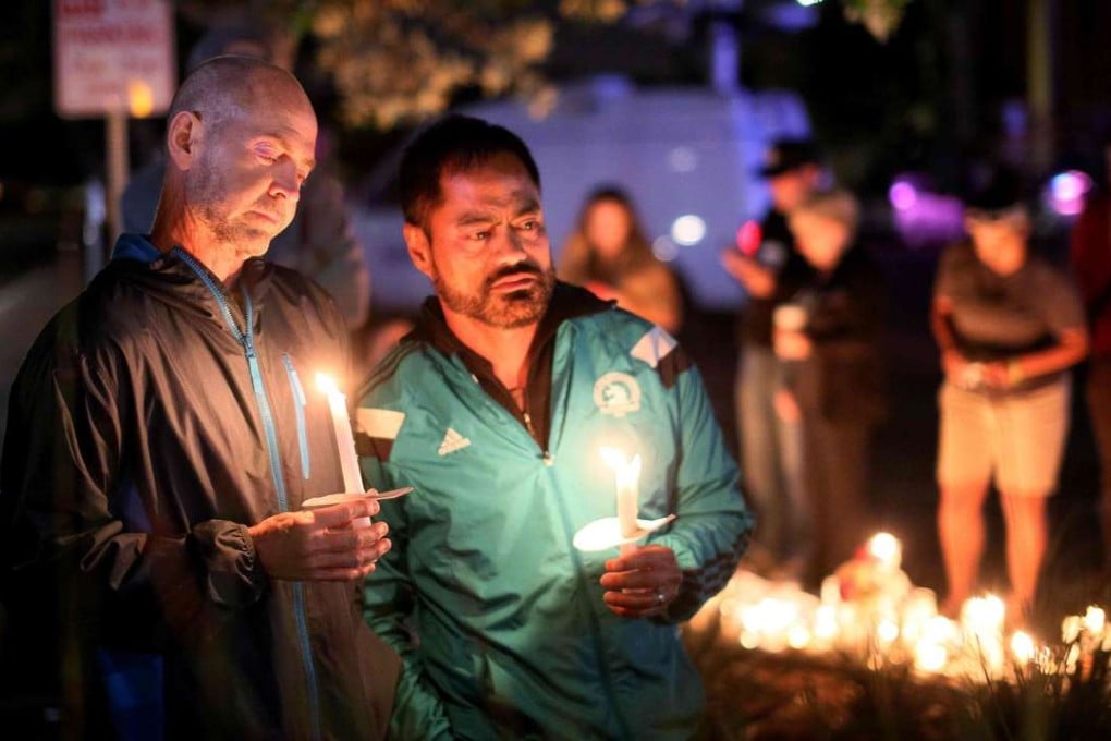 Mourners pay tribute to the victims of the Orlando shooting during a memorial service in San Diego, California on Sunday. Photo: AFP