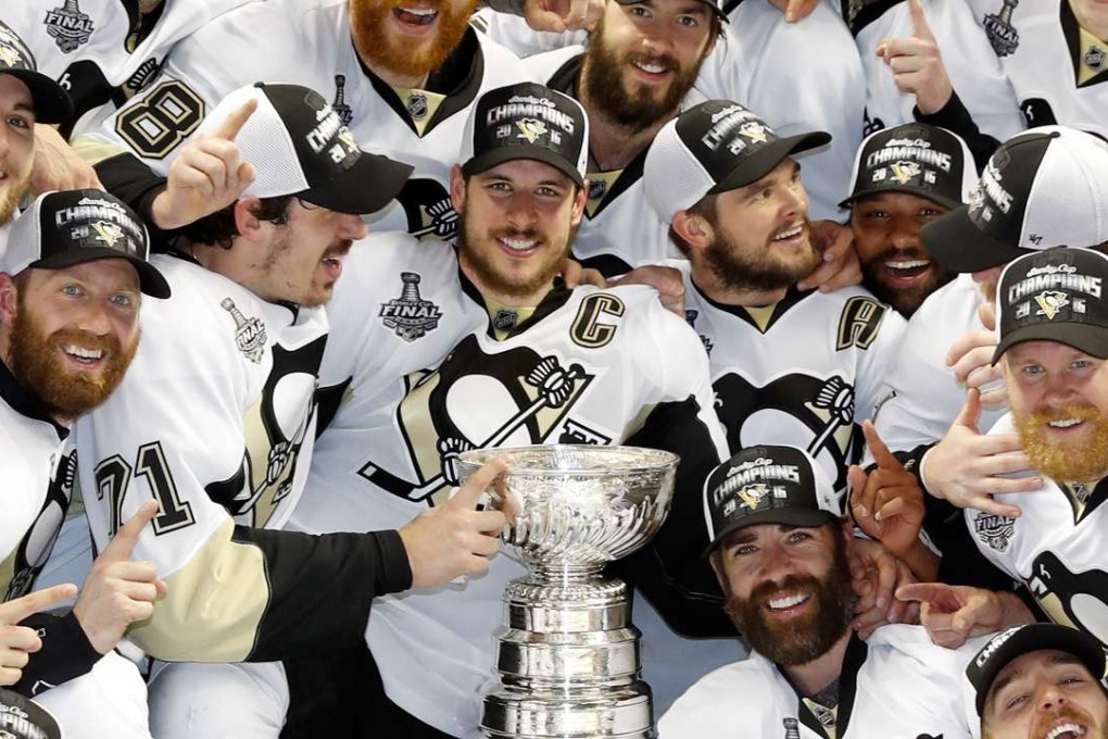Sidney Crosby and the Pittsburgh Penguins celebrate after their 3-1 victory to win the Stanley Cup against the San Jose Sharks in Game Six of the 2016 NHL Stanley Cup Final. Photo: Christian Petersen/Getty Images/AFP