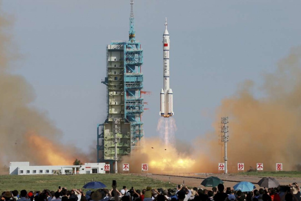 The Long March-2F rocket carrying China's manned Shenzhou-10 spacecraft – the nation’s most recent mission – blasts off in Gansu province on June 11, 2013. Photo: AP