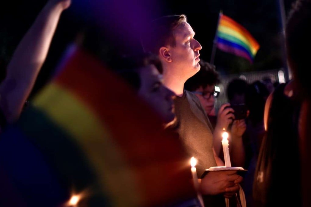 People gather outside the White House for a vigil after the worst mass shooting in modern US history at a gay nightclub in Orlando, Florida. Photo: Reuters
